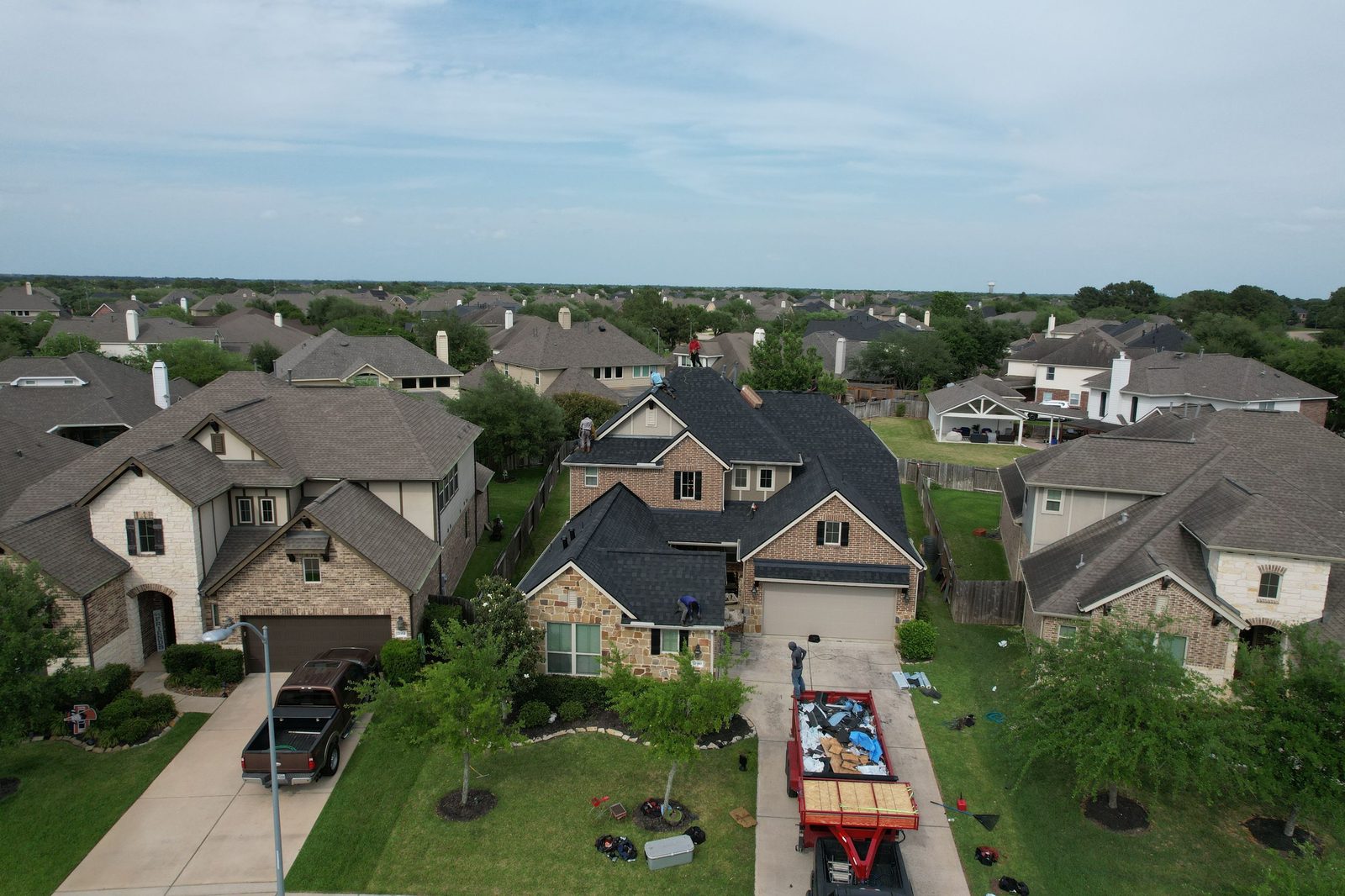 Completed roof on a Katy, TX home by Blue Rhino Roofing