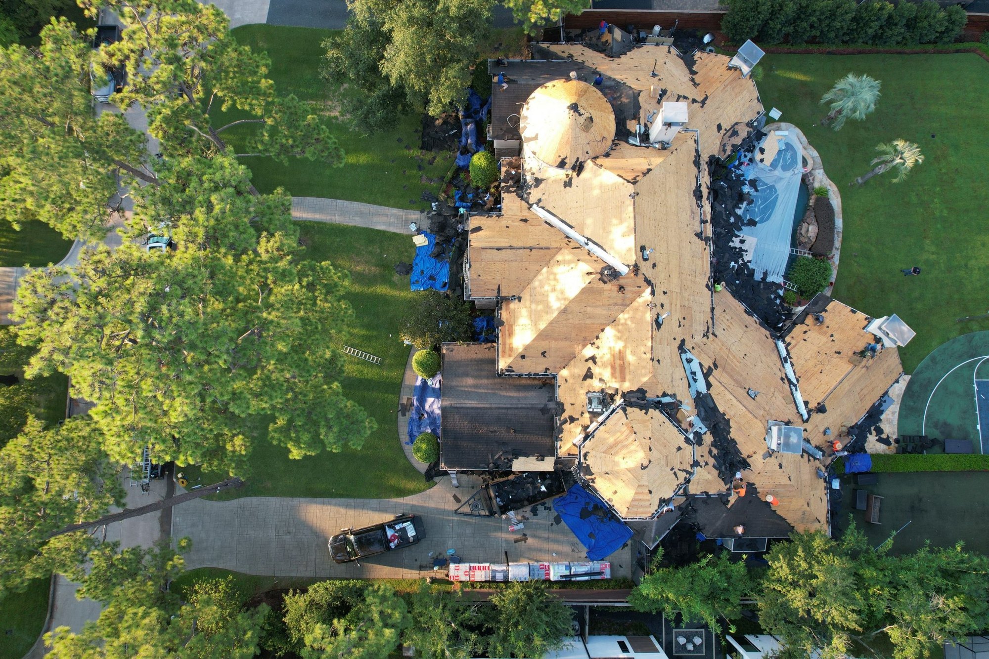 Aged, storm-damaged roof before replacement